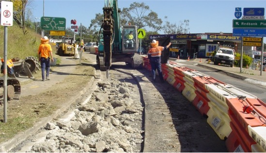 UDEC crew working on a road corridor project